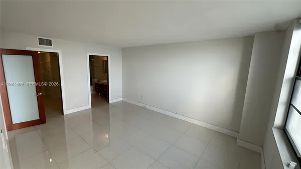 an empty room with closet