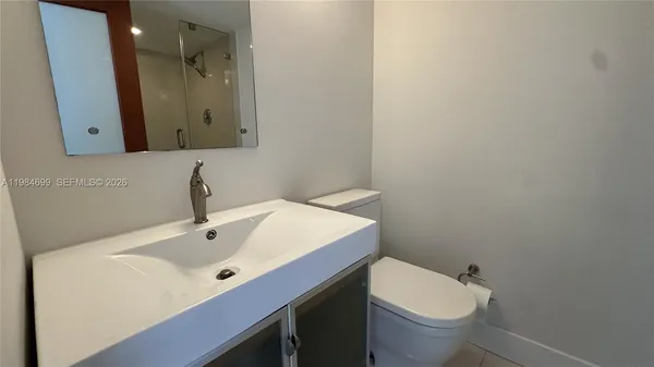 a bathroom with a sink and a toilet