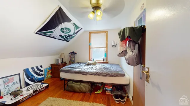 a bed room with a bed and a table