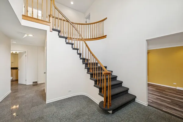 a view of entryway with wooden floor