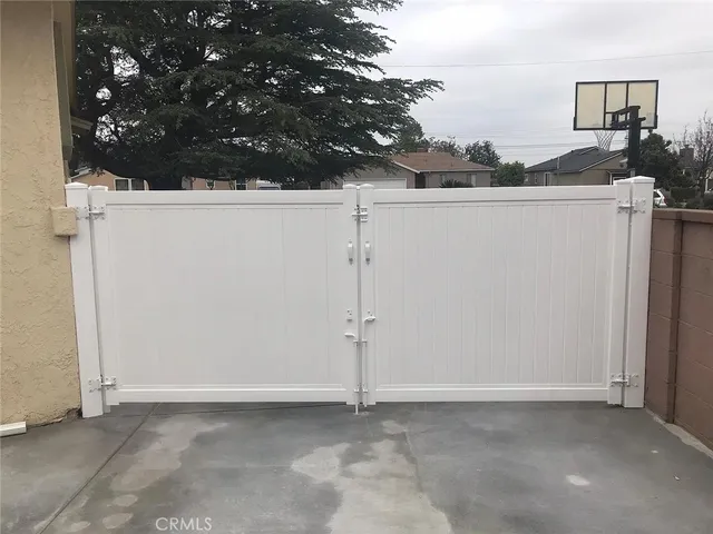 an empty room with a kitchen
