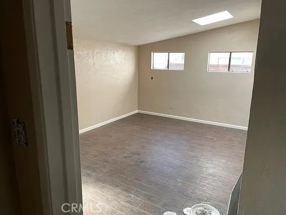 a view of an empty room and window