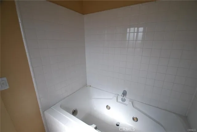 a bathroom with a sink and shower