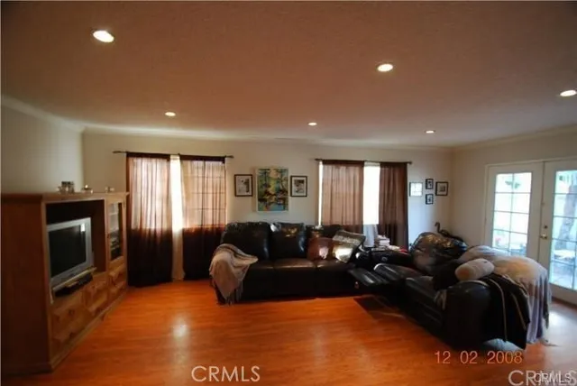 a living room with furniture window and a fireplace