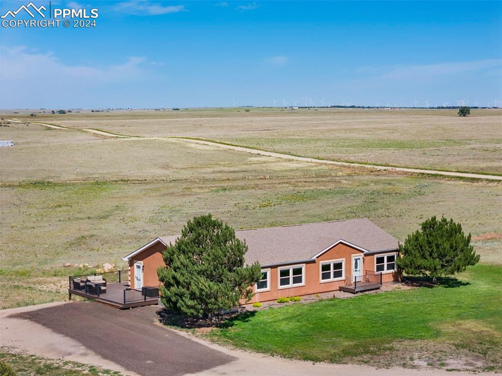39245 Big Springs Road Rush, CO 80833 - Photo 2 of 30 a aerial view of houses with outdoor space and ocean view