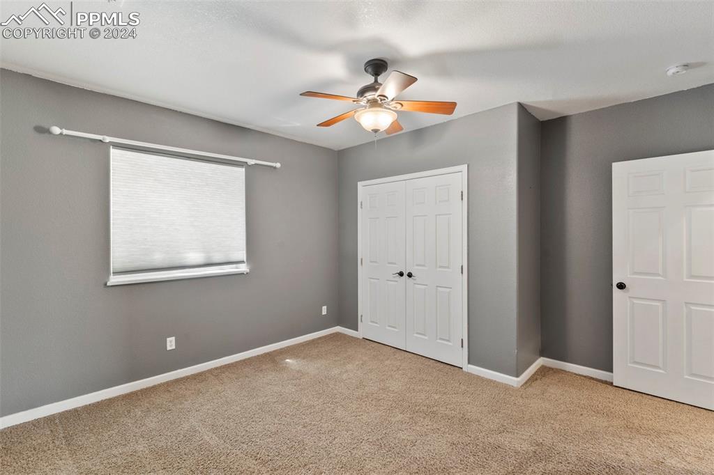 39245 Big Springs Road Rush, CO 80833 - Photo 26 of 30 a view of an empty room with a window