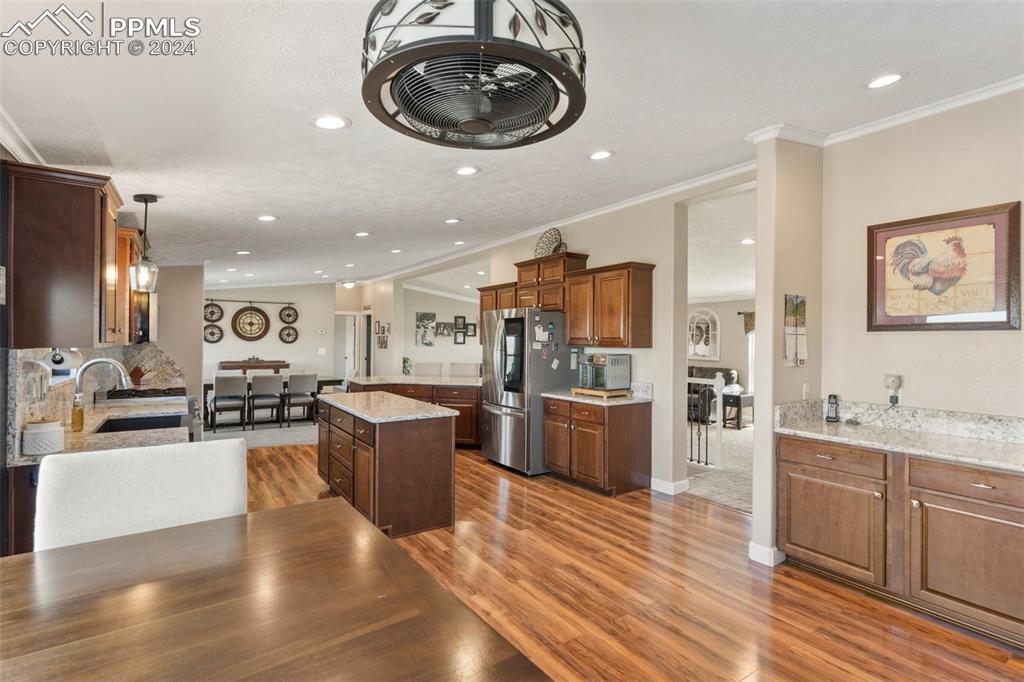 39245 Big Springs Road Rush, CO 80833 - Photo 7 of 30 a living room with furniture and a wooden floor