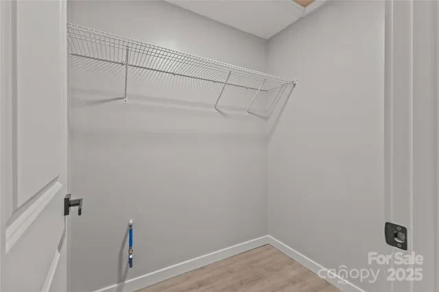 a view of a room with racks on the wall