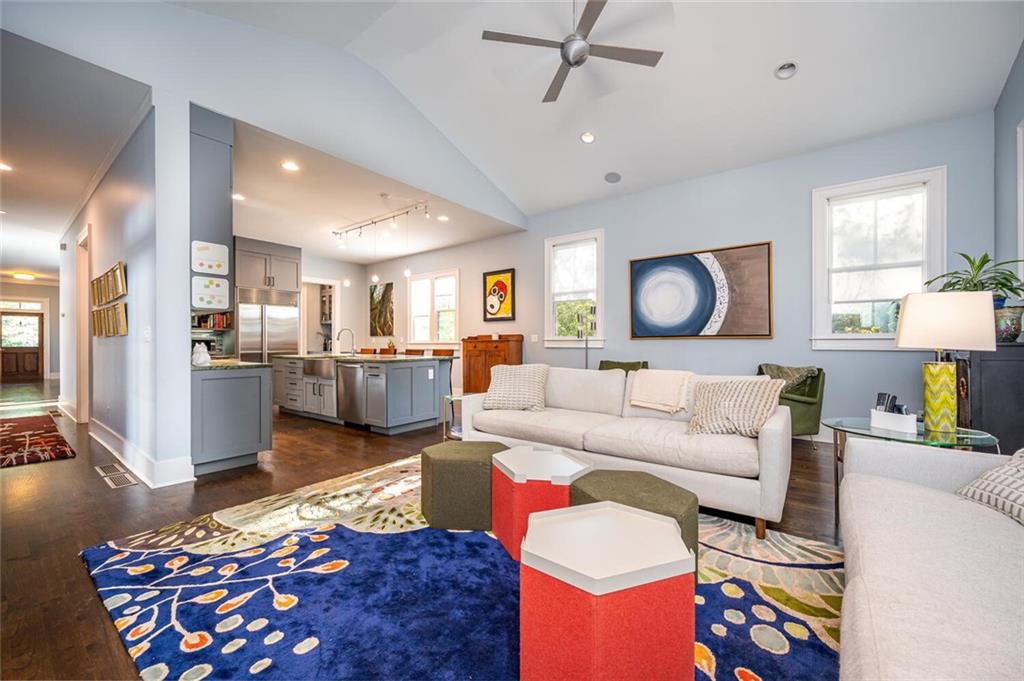 123 Ansley Street Decatur, GA 30030 - Photo 10 of 61 a living room with furniture wooden floor and a chandelier