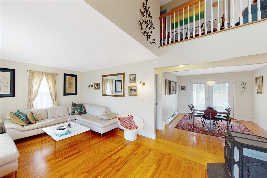 110 Orchard Avenue Middletown, RI 02842 - Photo 14 of 45 Sunny living room and wood stove