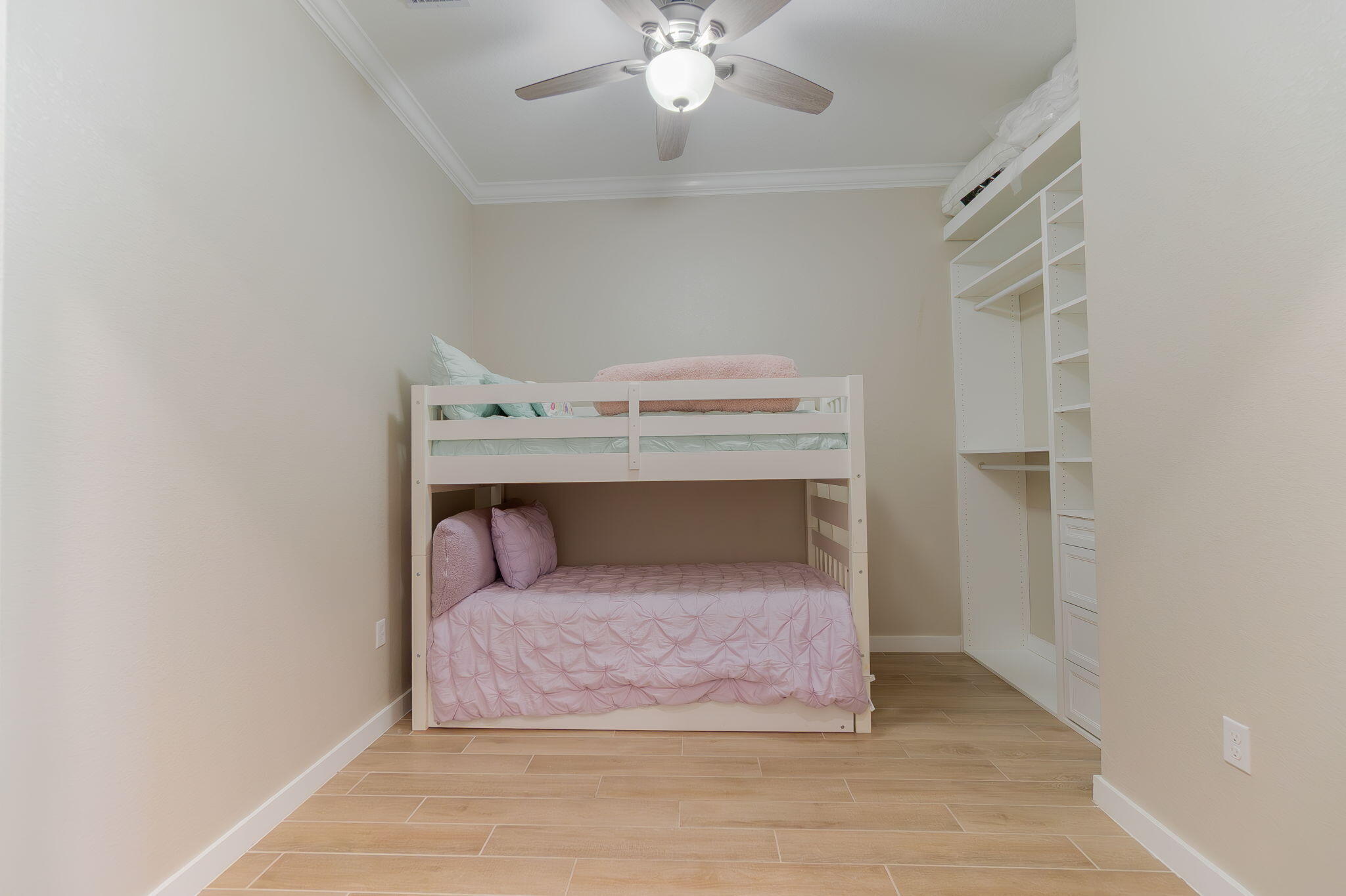19546 Weathervane Way Loxahatchee, FL 33470 - Photo 8 of 63 a bedroom with a bed and a chandelier