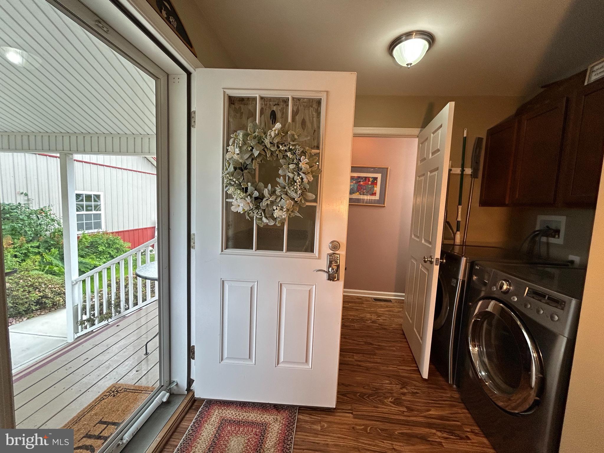 20346 Cool Spring Road Milton, DE 19968 - Photo 34 of 67 a view of a hallway with washer and dryer