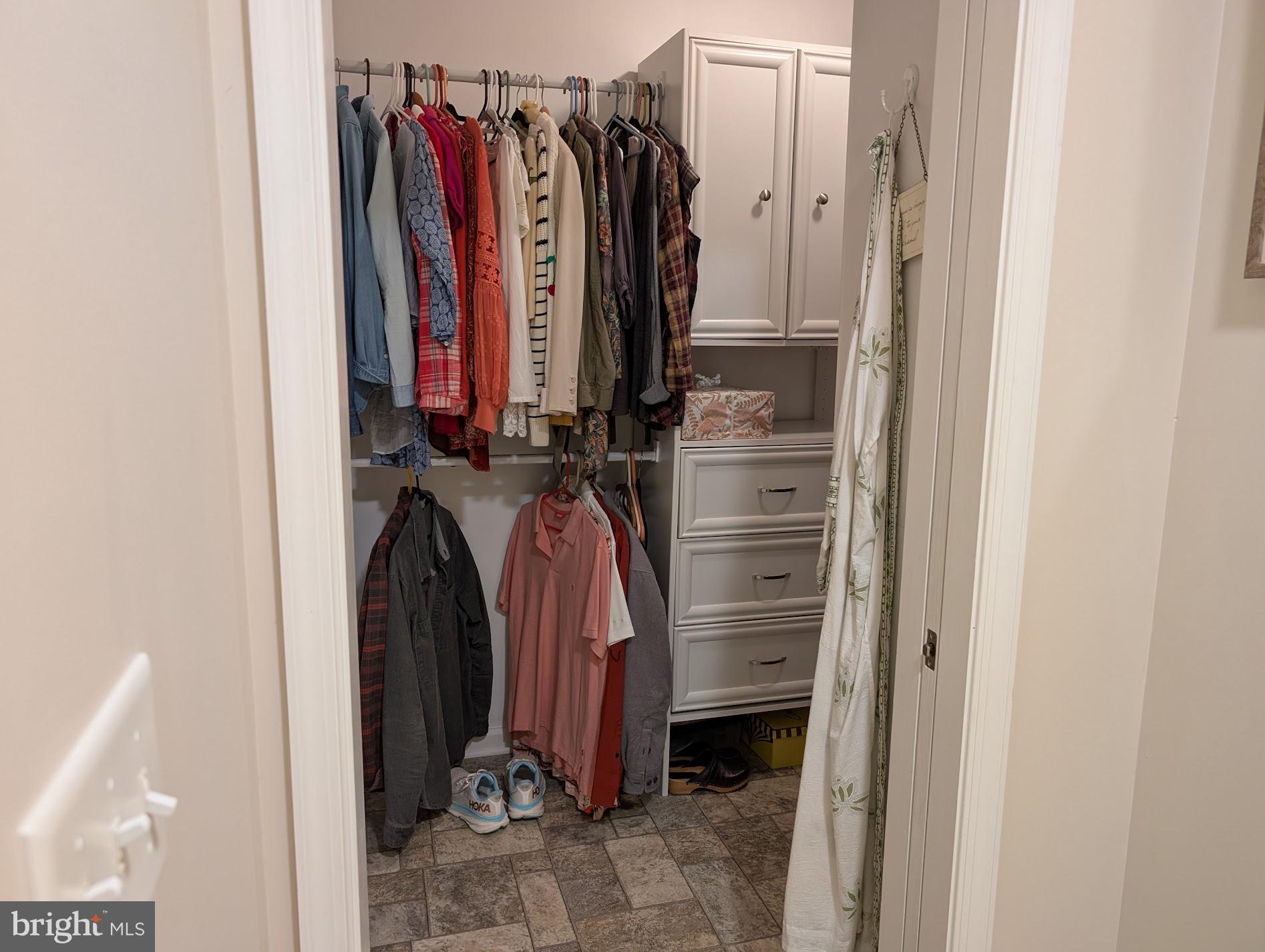 20346 Cool Spring Road Milton, DE 19968 - Photo 40 of 67 a view of walk in closet with clothes