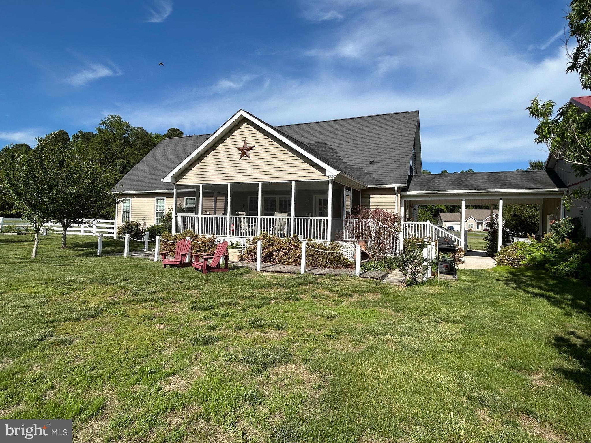 20346 Cool Spring Road Milton, DE 19968 - Photo 6 of 67 a view of a house with a yard and sitting area