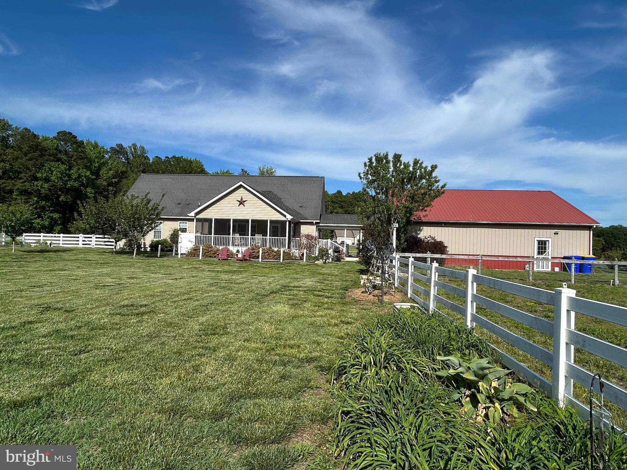 20346 Cool Spring Road Milton, DE 19968 - Photo 7 of 67 a front view of a house with garden