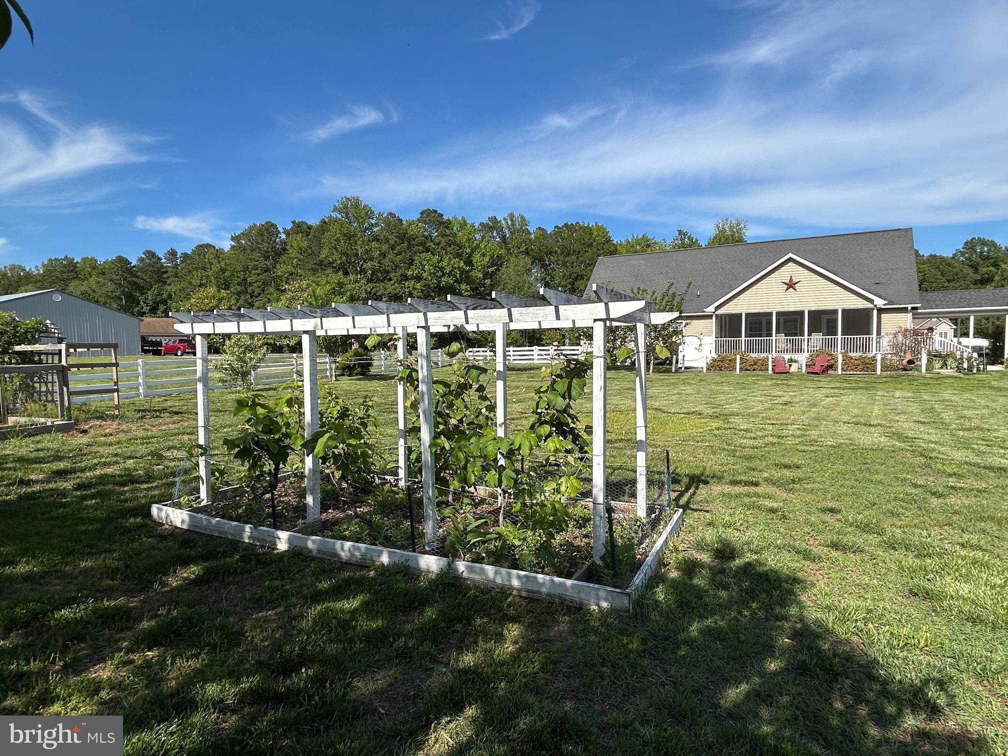 20346 Cool Spring Road Milton, DE 19968 - Photo 8 of 67 a view of a lake with a house in the background