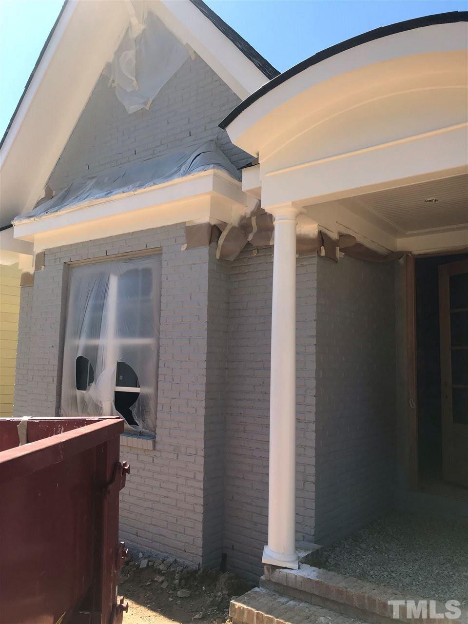 3608 Dixon Road Durham, NC 27707 - Photo 3 of 10 Painted gray brick
