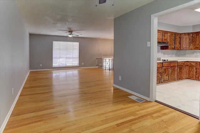 a view of a kitchen from the hallway