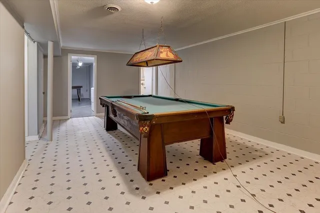 a bedroom with furniture and a closet