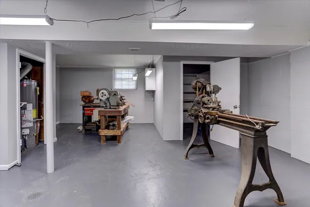 a view of an empty room with a closet