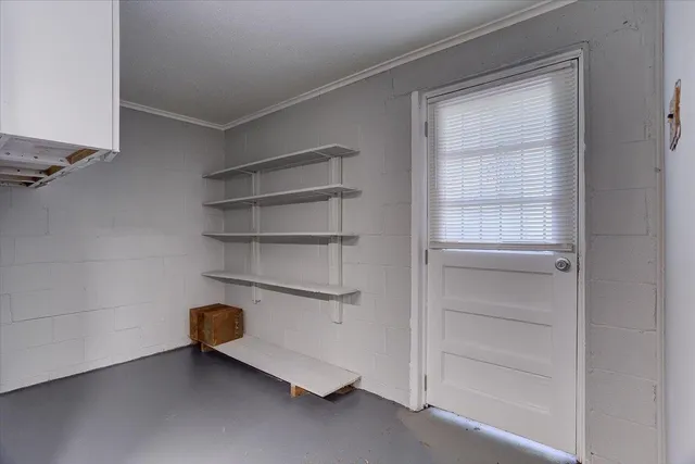 a room with storage and utility room