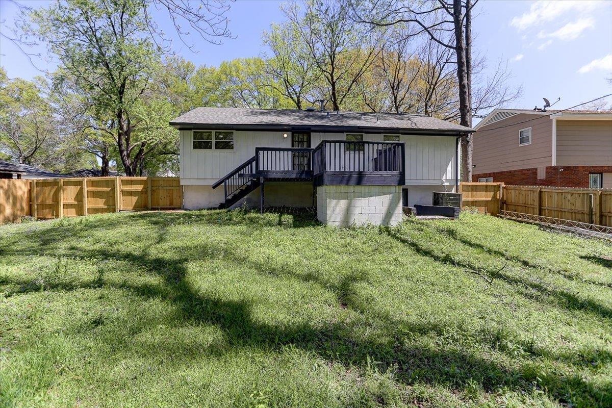 3263 Glen Logan Road Memphis, TN 38134 - Photo 36 of 40 a view of a house with a yard
