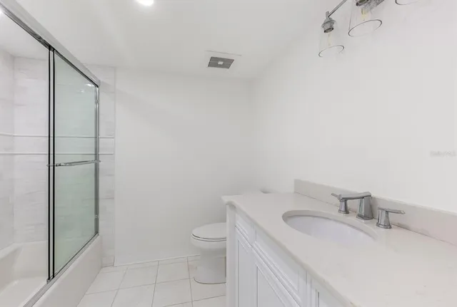 a view of a utility room with stairs