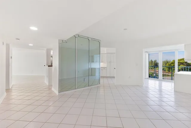 a view of an empty room and window