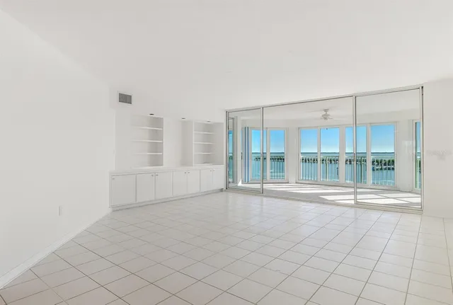 a view of a room with a large window