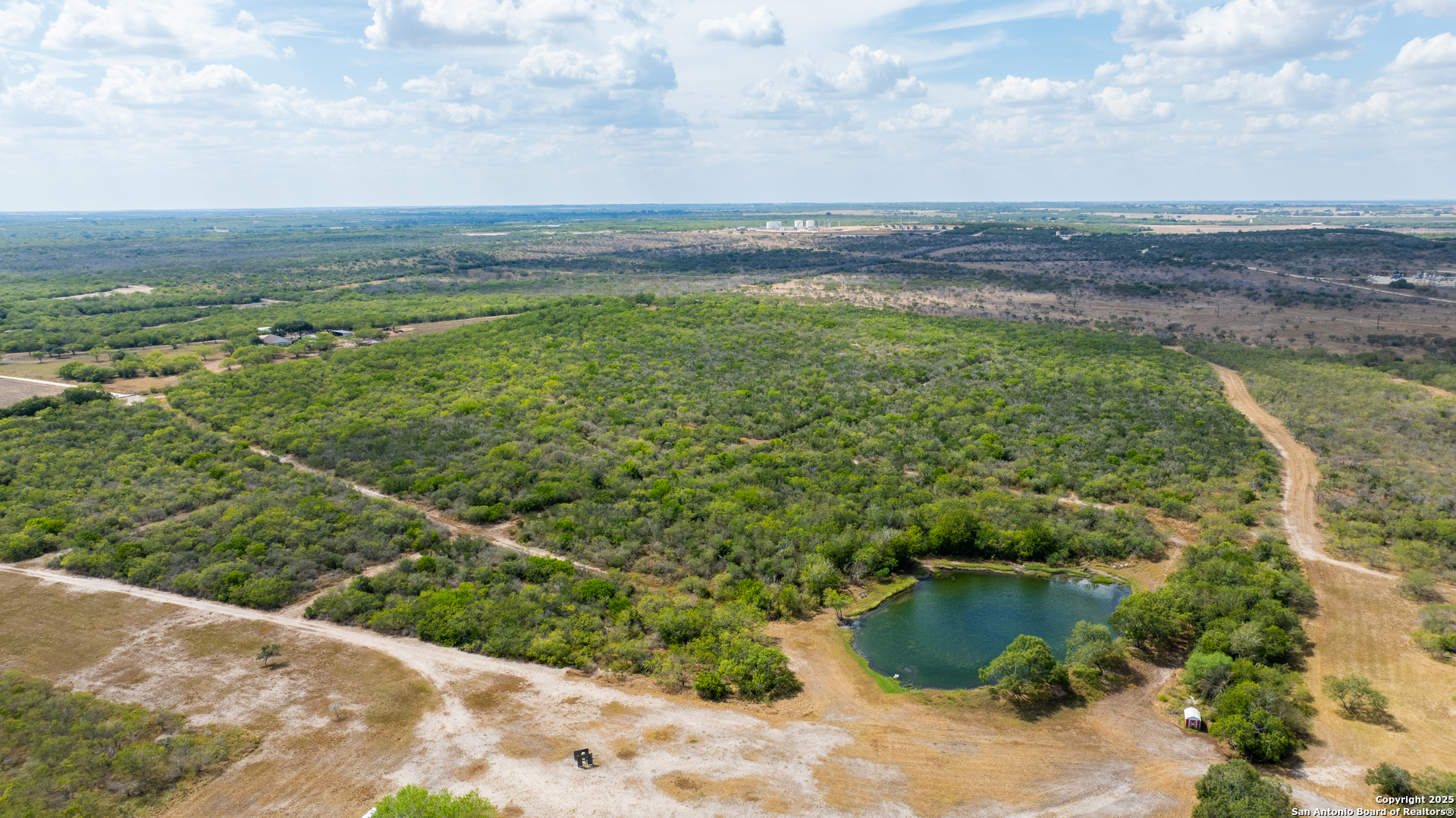 0 County Road 332 Runge, TX 78151 - Photo 13 of 44 a view of a lake with a yard