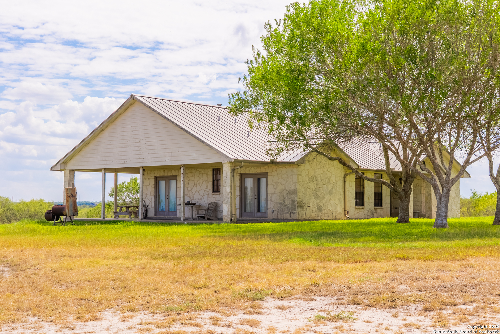 0 County Road 332 Runge, TX 78151 - Photo 19 of 44 a front view of house with yard and green space