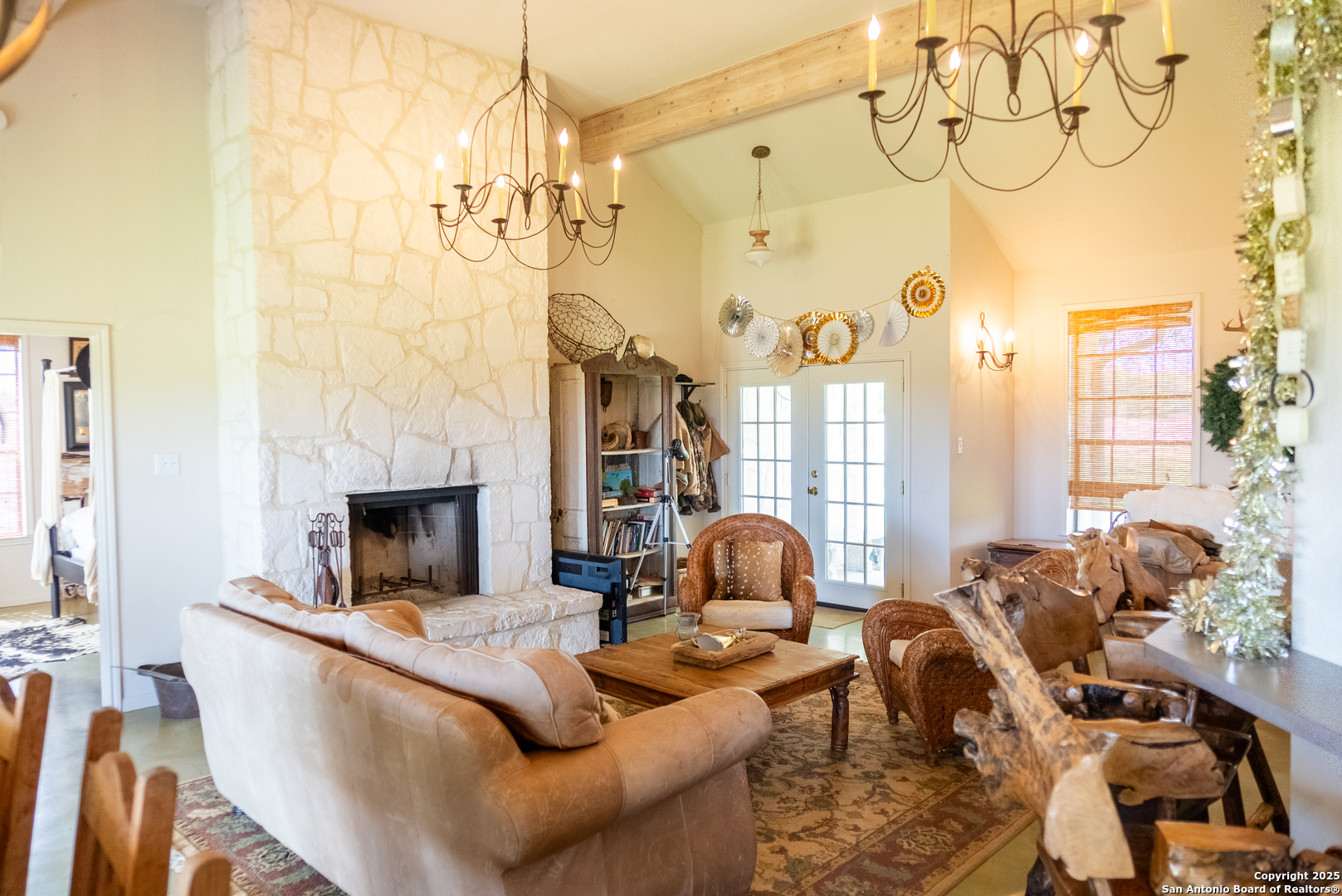 0 County Road 332 Runge, TX 78151 - Photo 21 of 44 a living room with fireplace furniture and a chandelier