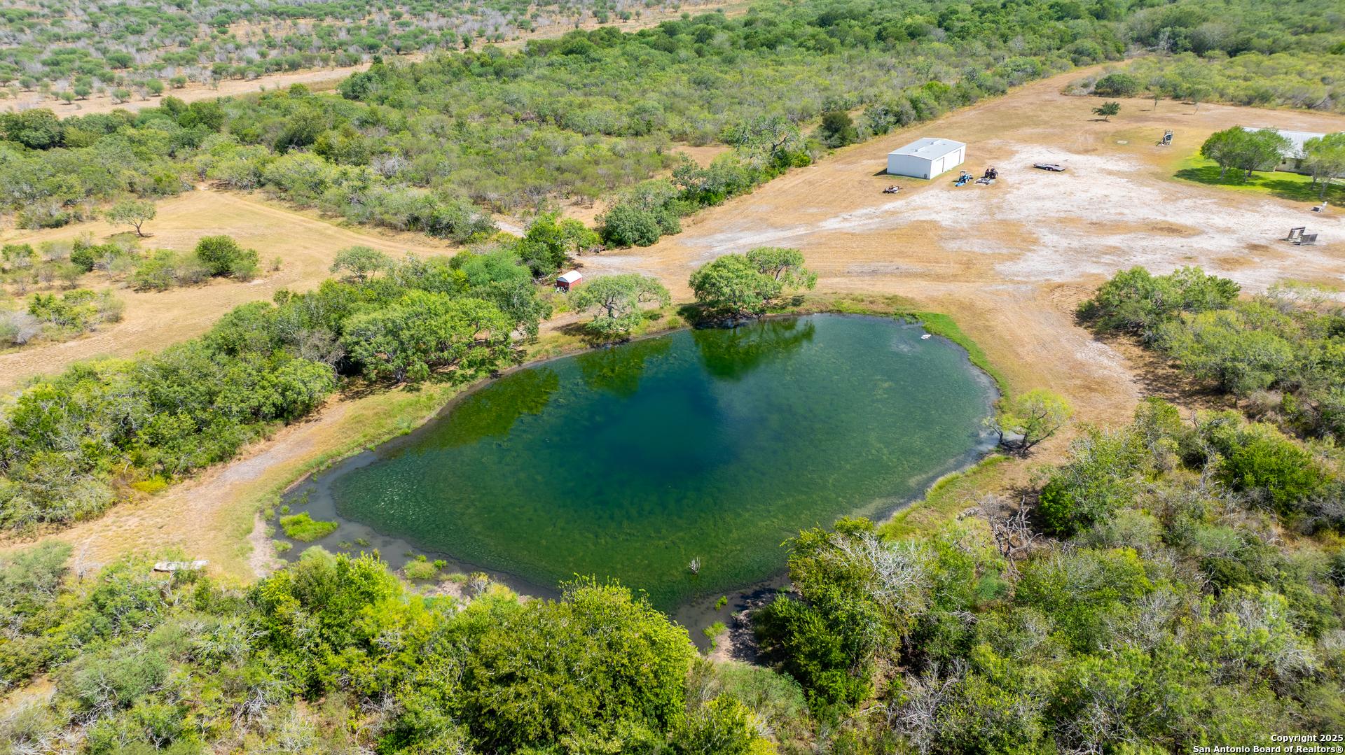 0 County Road 332 Runge, TX 78151 - Photo 10 of 44 a view of a garden with a lake