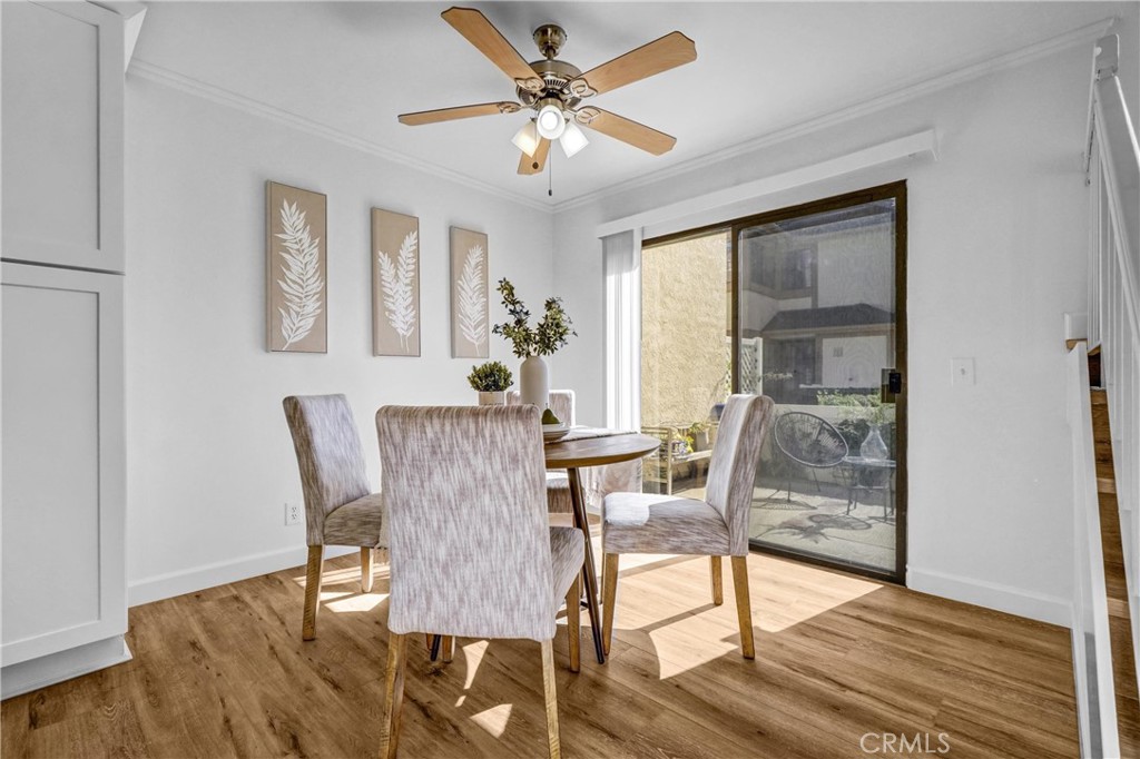 3110 Cochise Way, Unit 91 Fullerton, CA 92833 - Photo 7 of 25 a view of a dining room with furniture window and wooden floor