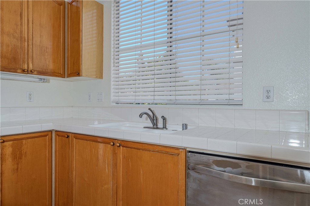 4526 Montecito Drive La Palma, CA 90623 - Photo 12 of 33 a bathroom with a sink and a mirror
