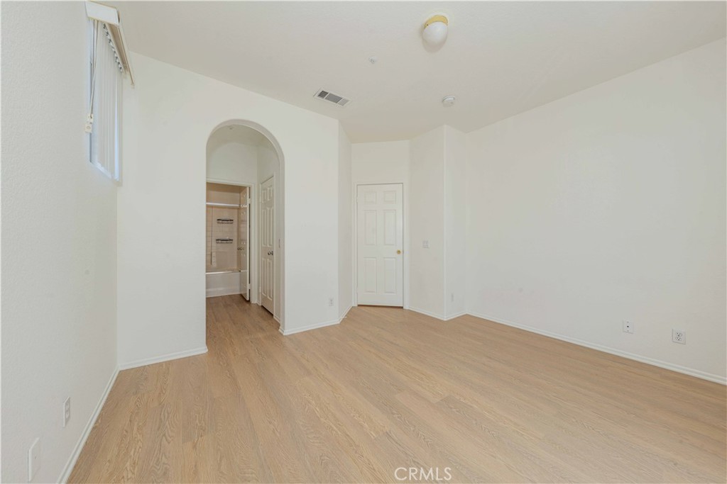 4526 Montecito Drive La Palma, CA 90623 - Photo 18 of 33 a view of empty room with ceiling fan