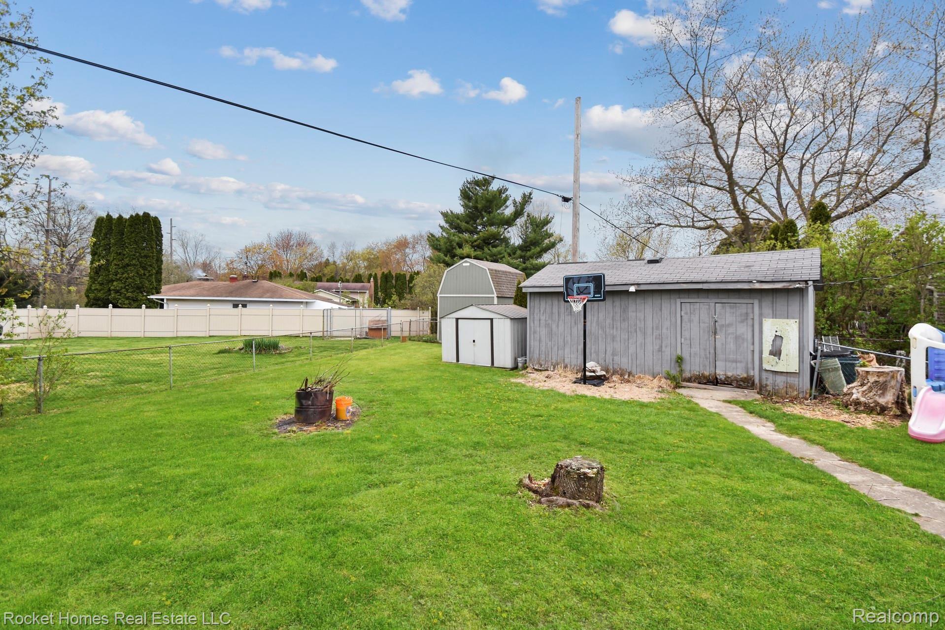 8561 Andersonville Road Clarkston, MI 48346 - Photo 31 of 34 030-photo-rear-view-8286524.jpg