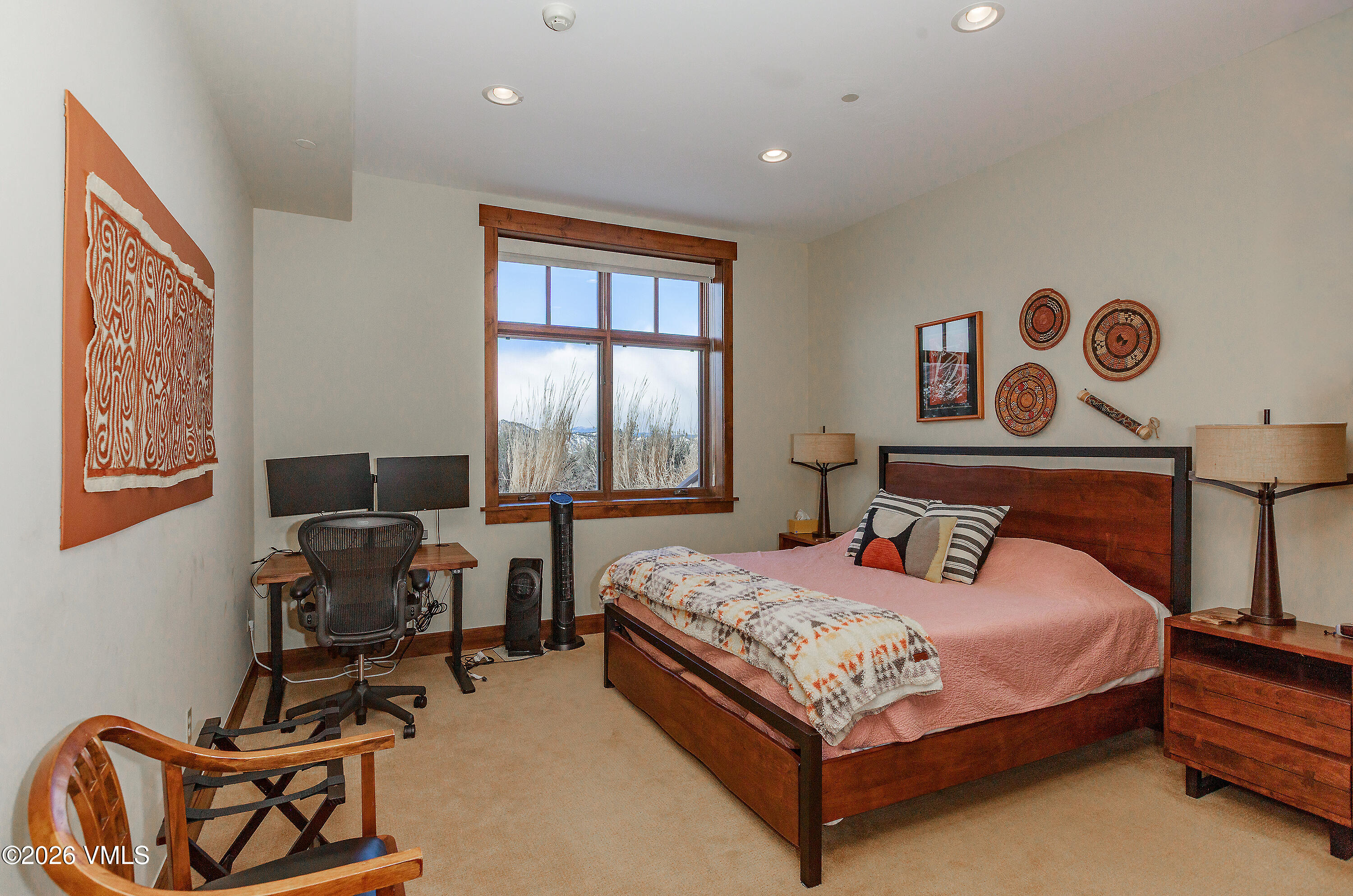 2753 East Haystacker Drive Eagle, CO 81631 - Photo 34 of 41 a bedroom with a bed and window