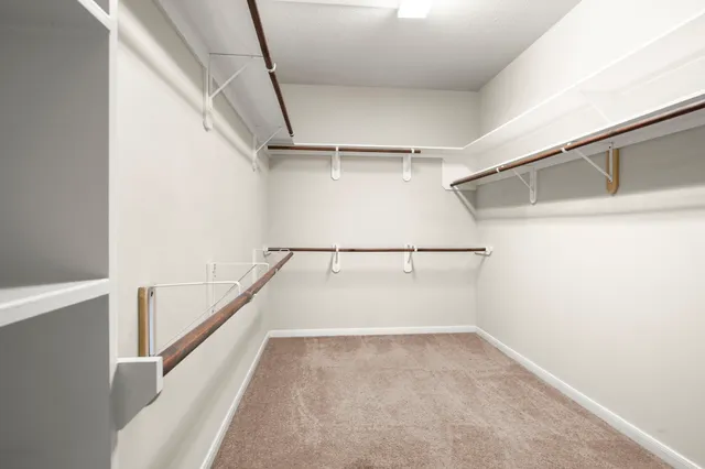 a view of an empty walk in closet