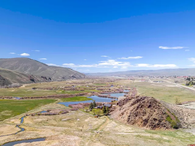 a view of an ocean and a mountain