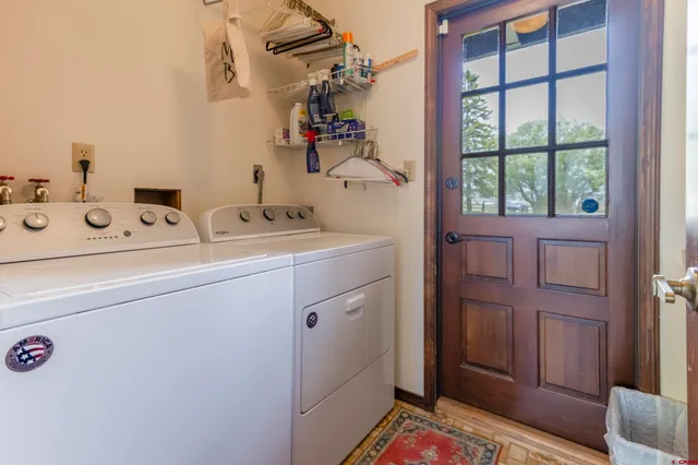 a utility room with dryer and washer