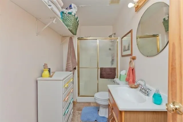 a bathroom with a sink a mirror and a vanity