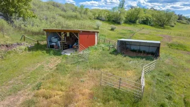a aerial view of a house with a ocean view