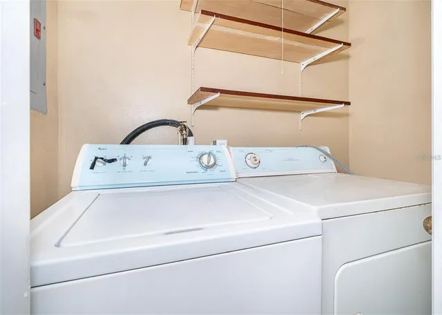 a utility room with dryer and washer