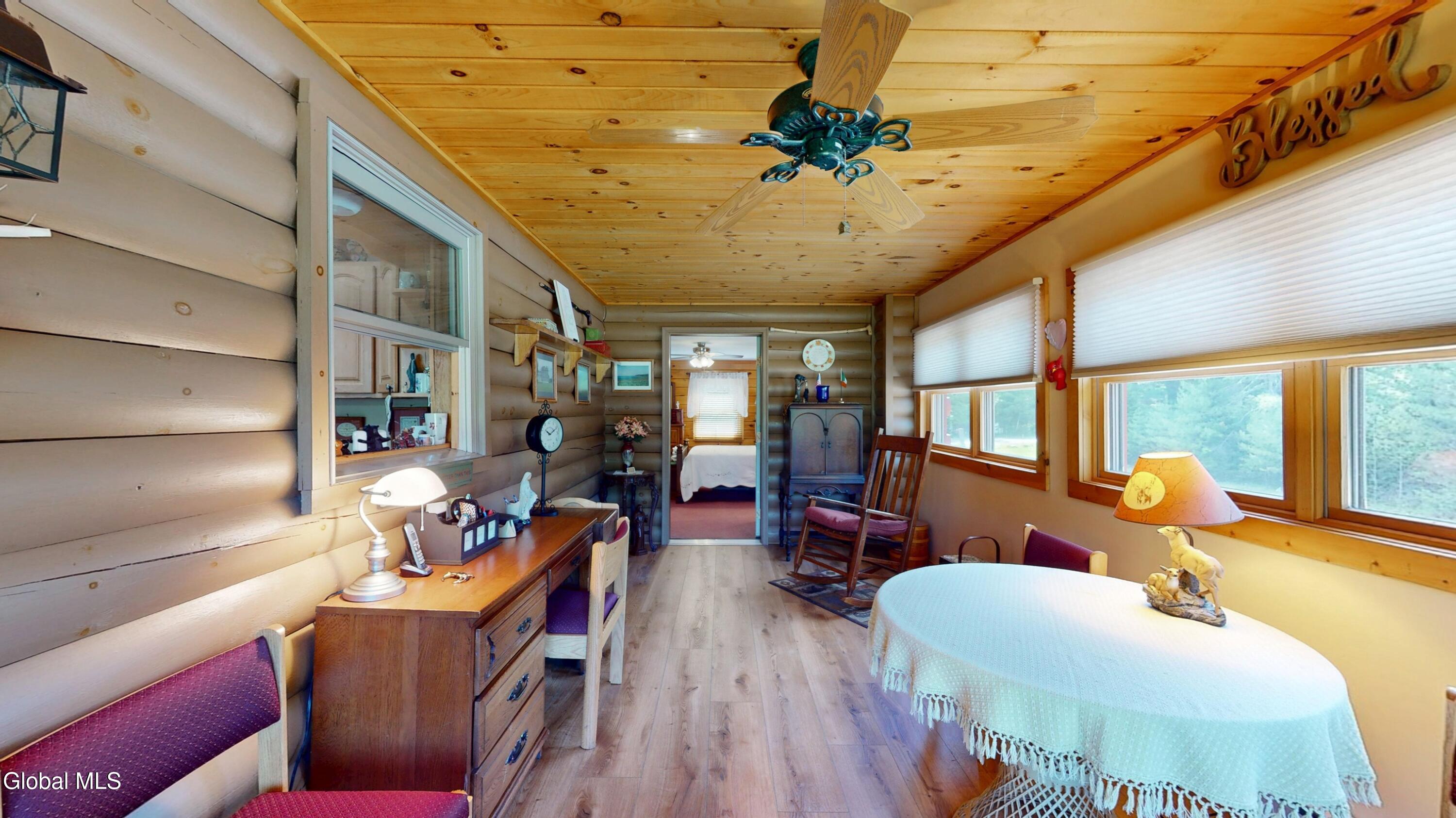 754 Church Road Minerva, NY 12857 - Photo 15 of 55 sun room