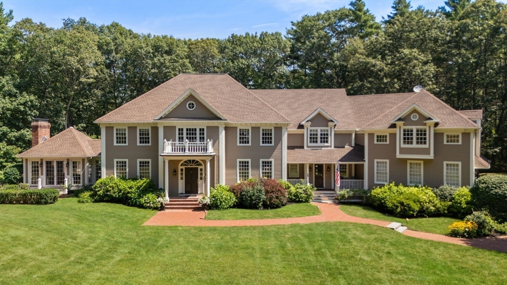 137 Lake Street Sherborn, MA 01770 - Photo 2 of 42 a front view of a house with a yard