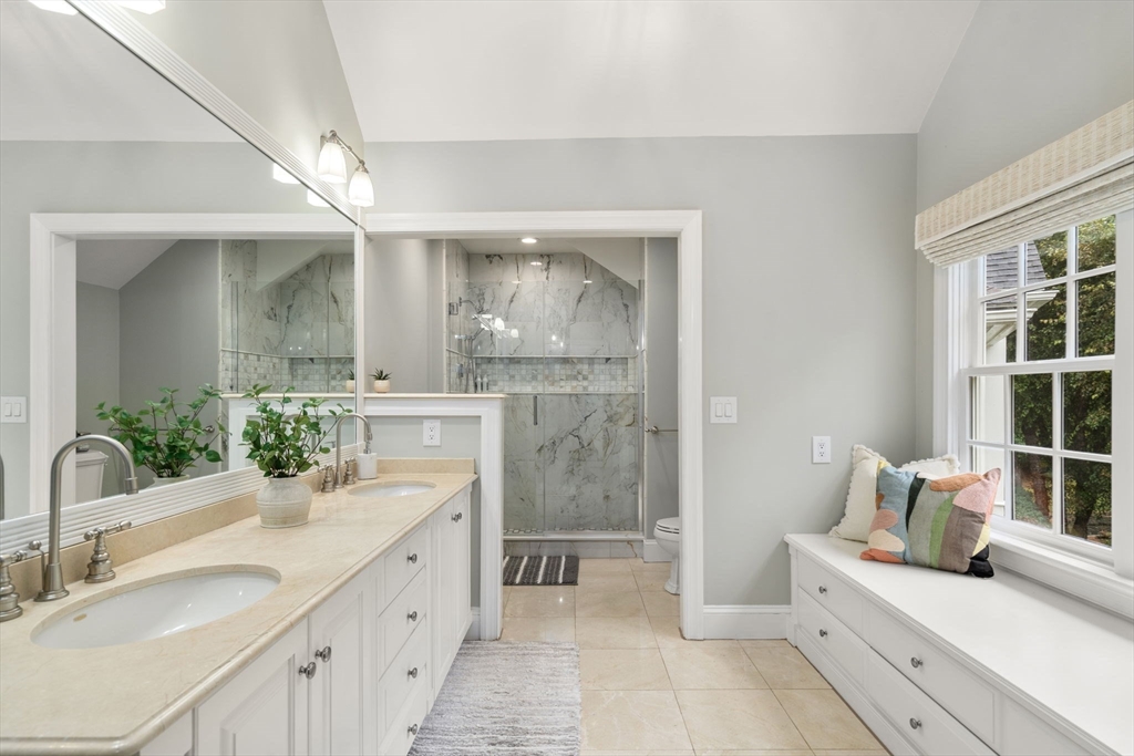 137 Lake Street Sherborn, MA 01770 - Photo 22 of 42 a bathroom with a double vanity sink mirror and shower