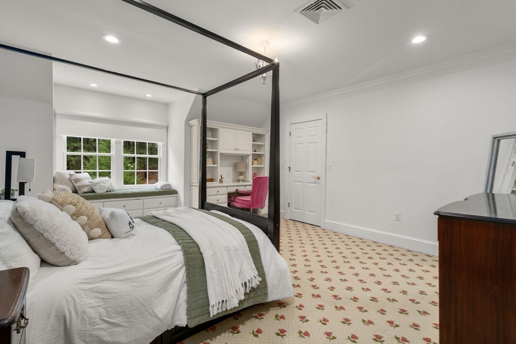 137 Lake Street Sherborn, MA 01770 - Photo 23 of 42 a bedroom with a bed and a window