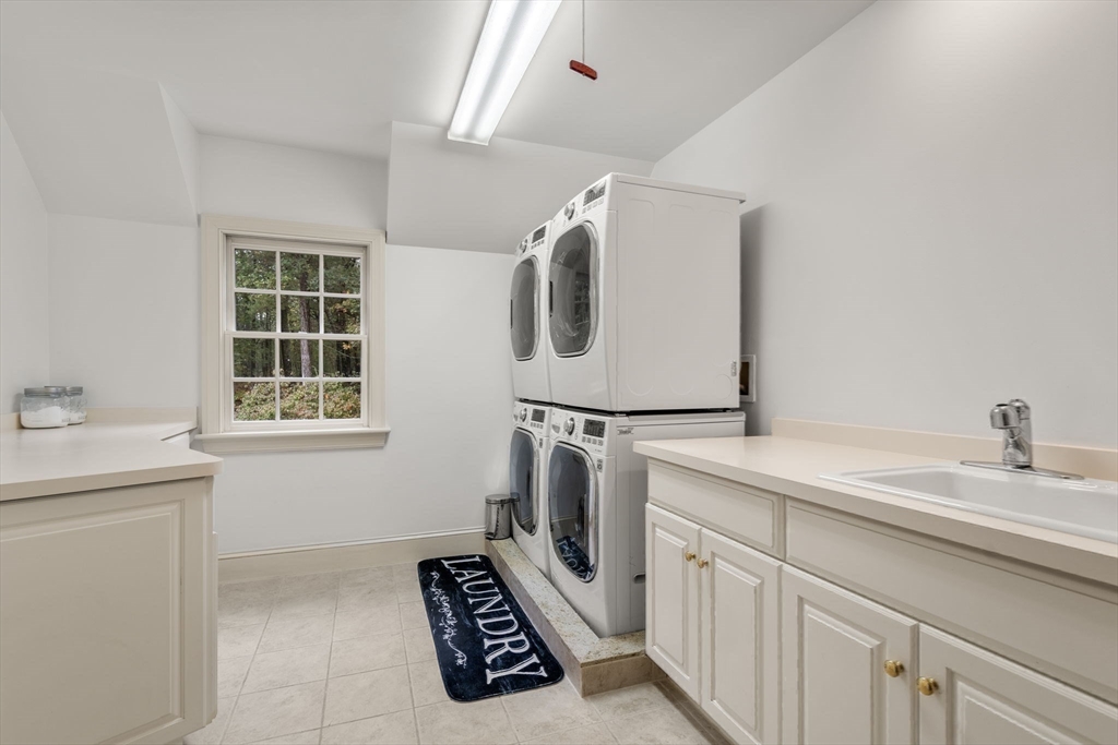137 Lake Street Sherborn, MA 01770 - Photo 24 of 42 a utility room with sink dryer and washer