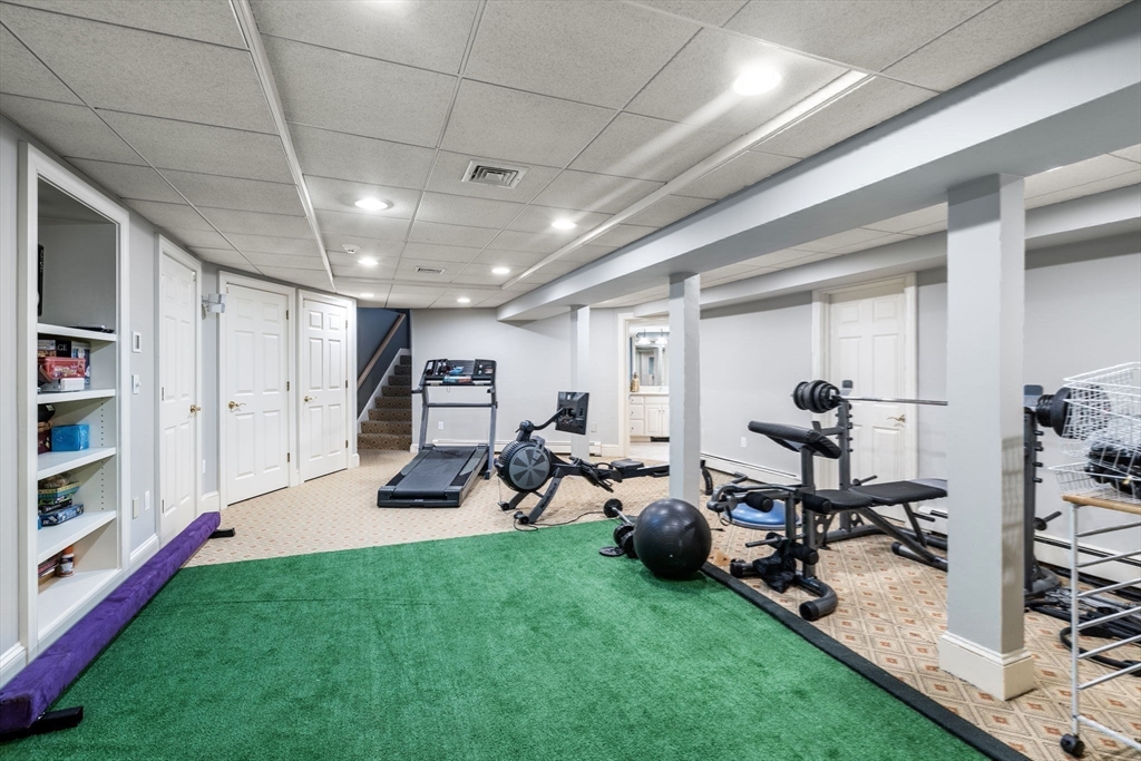 137 Lake Street Sherborn, MA 01770 - Photo 29 of 42 a view of a room with gym equipment